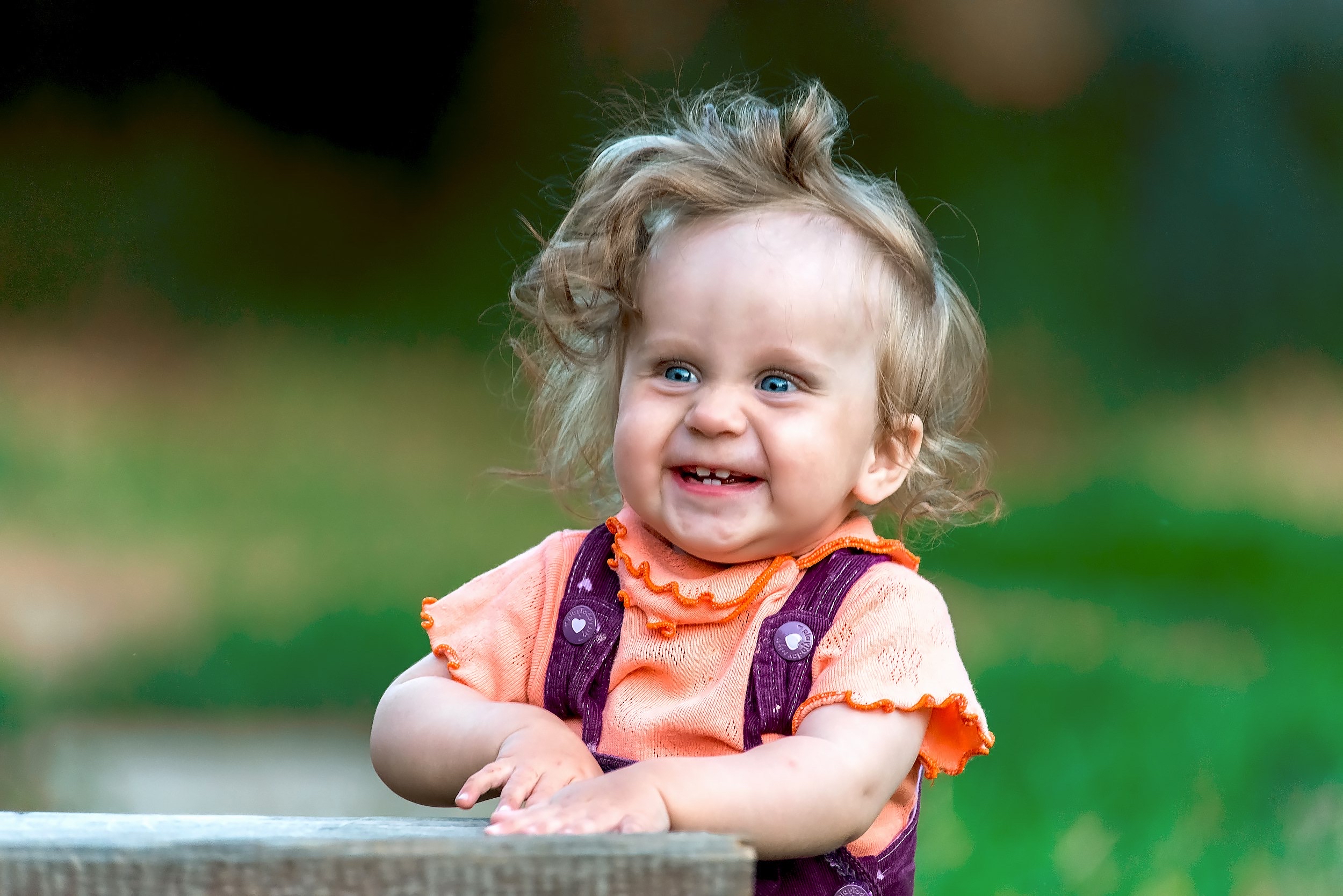 happy infant with early oral development milestones supported by pediatric dental care at Olathe Pediatric Dental in Olathe, KS